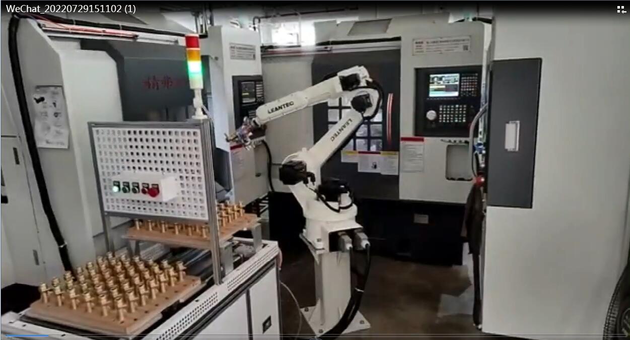 運用工業機器人對機床上下料的自動化設備