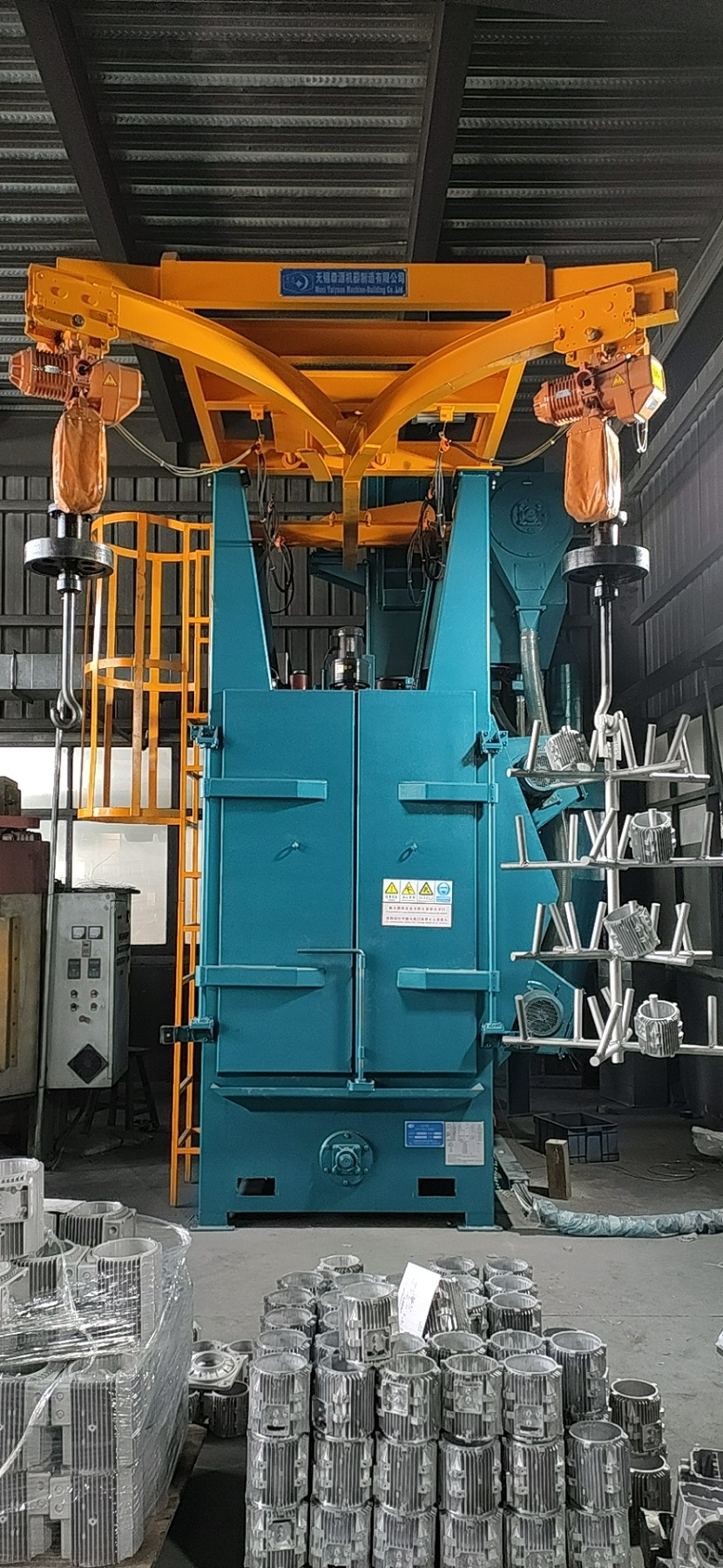 無錫泰源吊掛式全自動(dòng)拋丸清理機(jī)