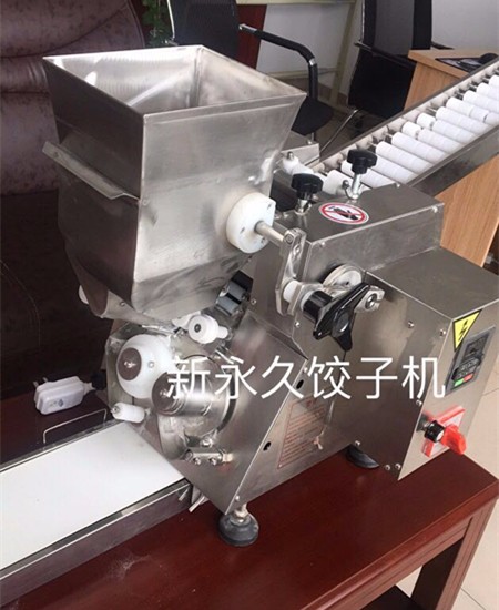 壽命長(zhǎng)且不易損的全自動(dòng)仿手工餃子機(jī)